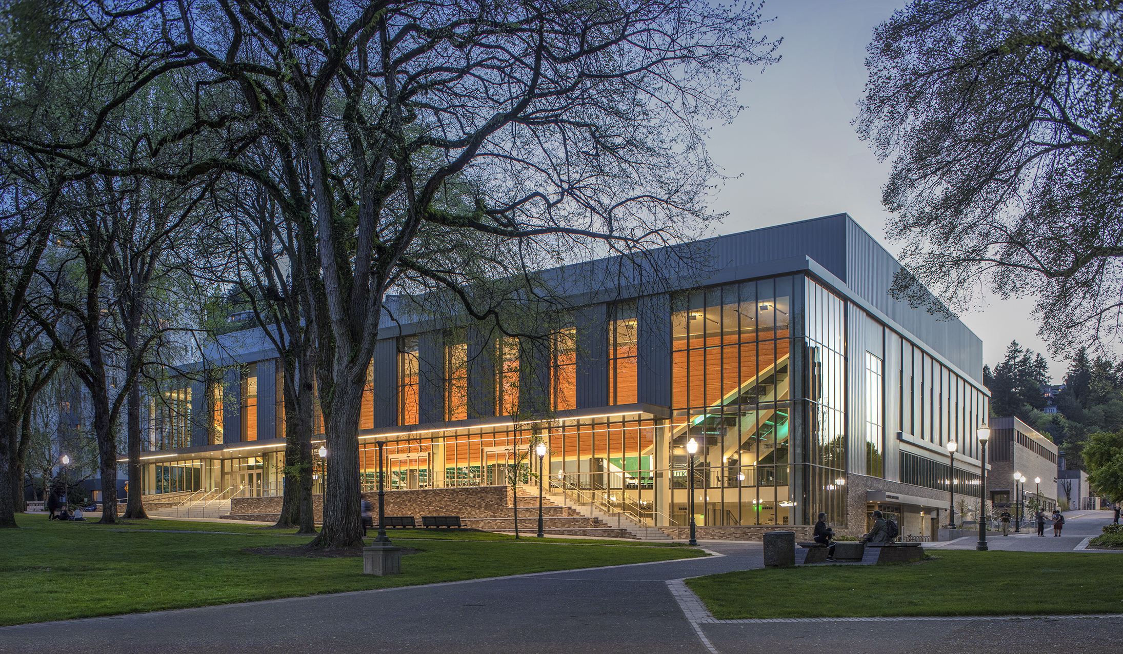 glass fronted building illuminated by light